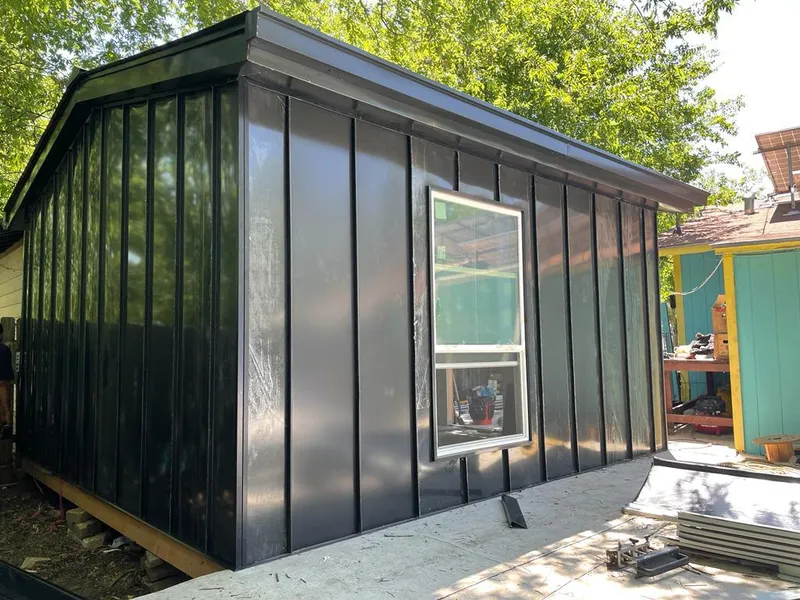 Black standing seam metal wall panels for Metal Roof Installation in Tulare